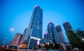 Отель Qingdao Jinshan We+ Holiday Apartment (Wusi Square)  Циндао